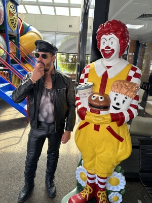 One of these clowns offers soft buns and prime Aussie beef. The other is Ronald McDonald.